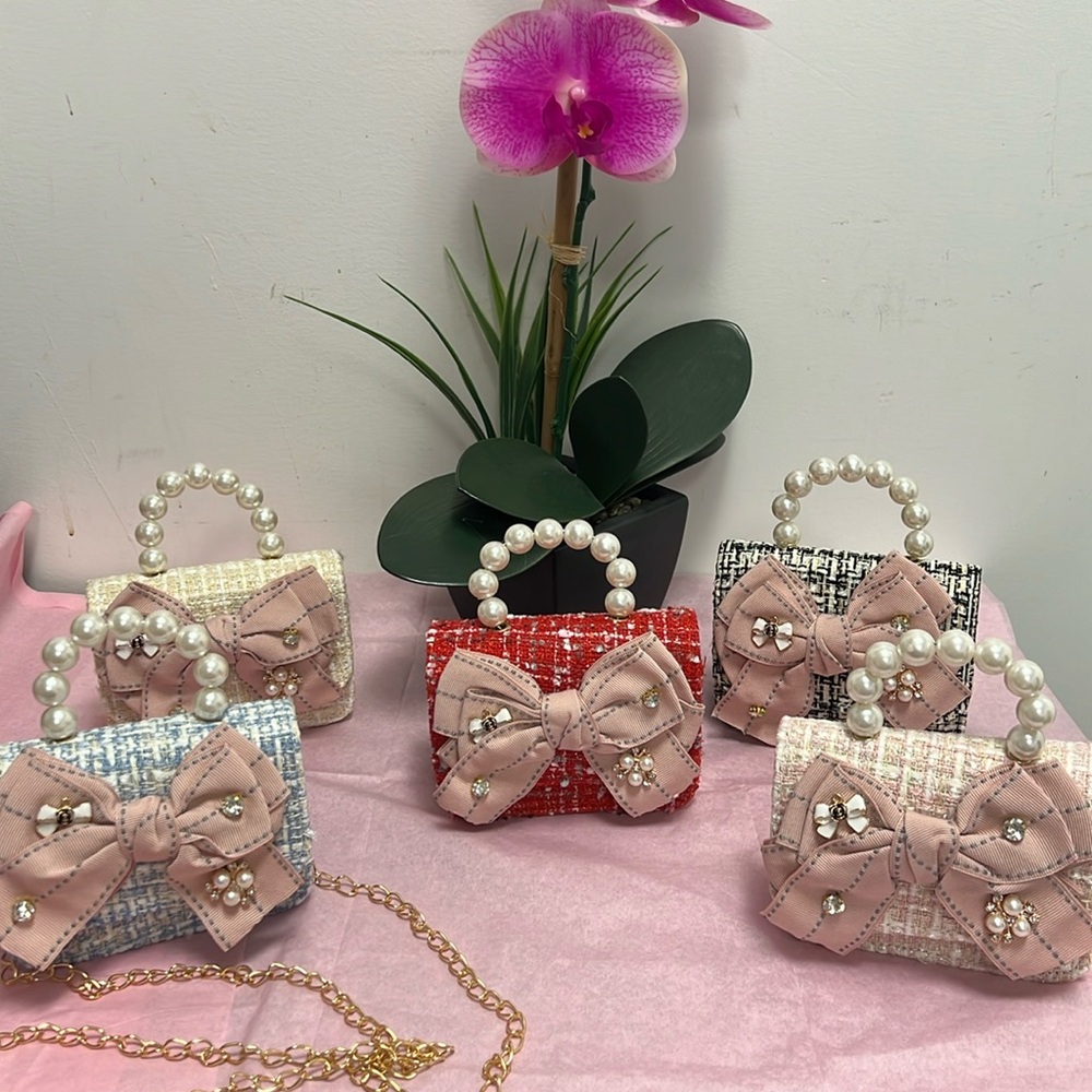 NIP!! Cute princess handbags.